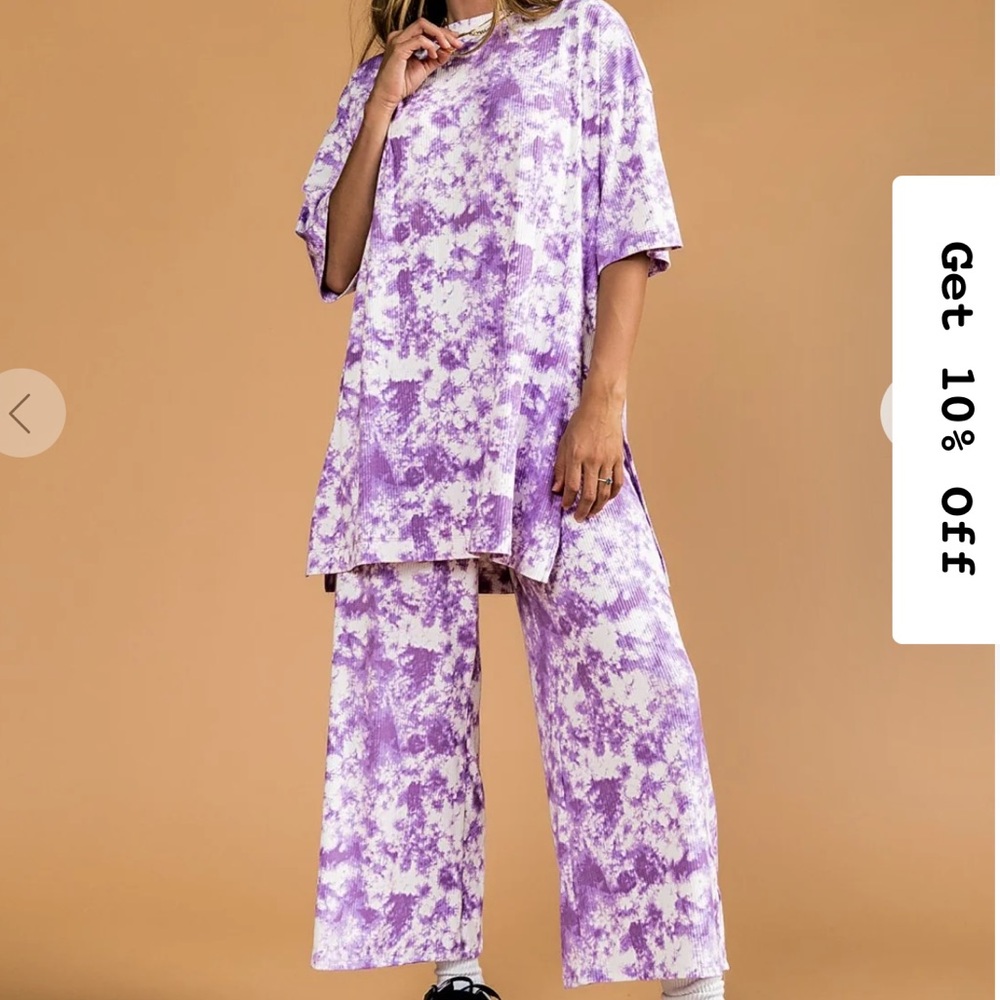 DRESSED IN LALA gently used ribbed playsuit in cosmic tie dye